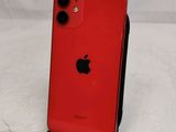 a close up of a red iphone sitting on top of a table