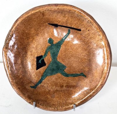 a brown bowl with a green silhouette of a man holding a baseball bat