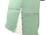 an image of a green and white vest on a hanger