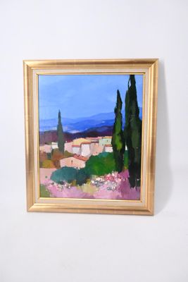 une peinture à l'huile représentant une vue d'un village avec des arbres au premier plan