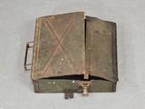 a small metal box with a key in it