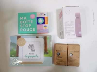 two boxes of soap, a bottle of lotion, and a box of soap