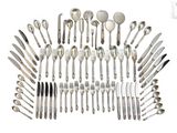 a lot of spoons and spoon spoons on the table