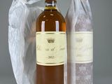 a bottle of wine that is next to a bottle of wine