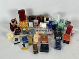 a lot of different types of perfumes on the table
