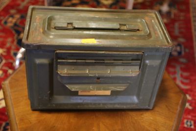 a toaster sitting on top of a wooden table