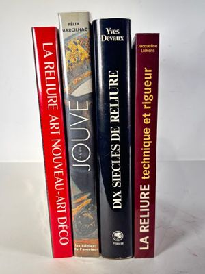 three books that are sitting on top of each other