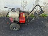a small machine that is sitting on the ground