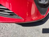 a close up of the front of a red car