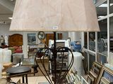 a lamp that is sitting on a table in a room