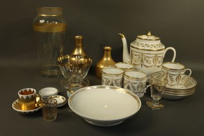 a table with a lot of gold and silver items on it