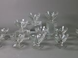 a lot of glass vases that are sitting on a table
