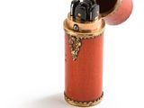 a lighter that is sitting on a white surface