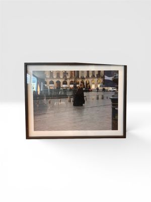 a picture of a picture of a woman walking in the rain