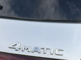a close up of a car ' s tail light with the word zomatic on it