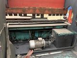 an image of a machine that is working on a piece of wood