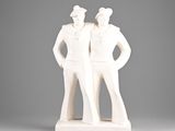 a white statue of two men standing next to each other