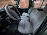 a car that has a steering wheel and a seat in it