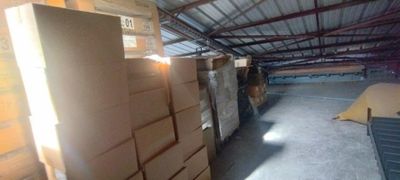 a room with a lot of boxes on the floor