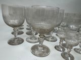a lot of empty wine glasses on the table