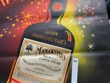 a poster for a liquor company with a bottle of liquor on it