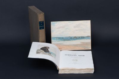 an open book sitting on top of a table next to a painting