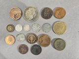 a lot of coins that are on the table