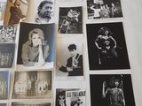 several black and white photographs of people on a white surface