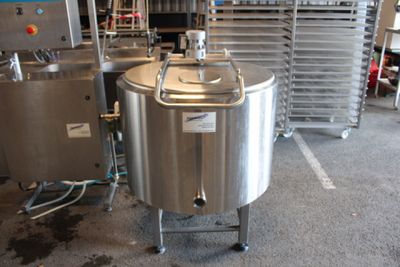 a large metal tank sitting in the middle of a room