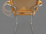 an image of a yellow chair with wires attached to it