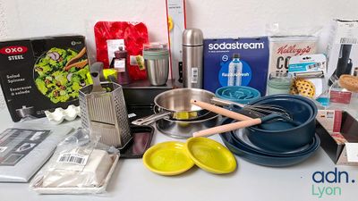 a table with a variety of cooking utensils on it