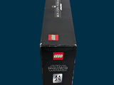 a black box with a lego star wars cake in it