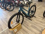 a bike that is sitting on a stand in a room