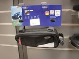 a bag hanging on a wall with a credit card attached to it