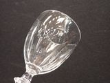 a wine glass that has been broken and is sitting on a table