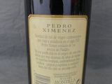 a bottle of wine that is sitting on a table