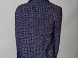 the back view of a purple jacket on a mannequin mannequin mannequin mannequin mannequin mannequin mannequin manne