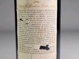 a label on a bottle of wine on a table
