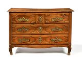 a wooden chest of drawers with brass hardware on the drawers