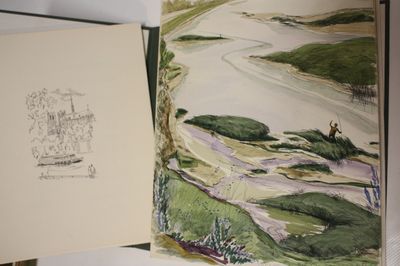 a book with a picture of a river in it