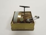 a small metal box with a metal handle and a handle on it