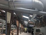 a large room with a lot of pipes in it