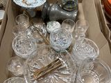 a box full of glassware on a table