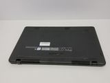 a laptop that is sitting on a white table