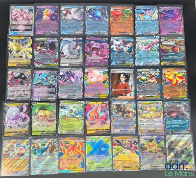 a large collection of pokemon cards are displayed on a table