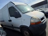 a white van that is parked in a parking lot