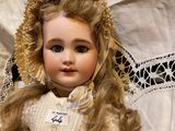 a close up of a doll on a table
