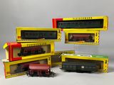 three boxed trains are sitting on a table next to each other