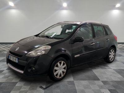 a picture of a black car parked in a garage
