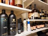 many different types of hair products on the shelves